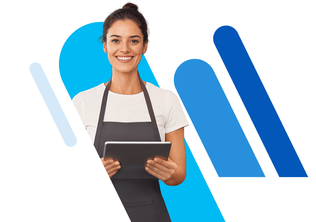 Smiling pastry chef holding a tablet computer